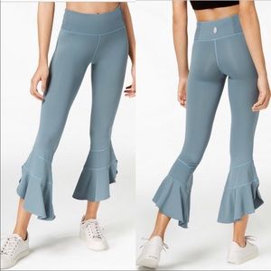 Free People Movement Starlight Flared Yoga Pant size S. Ruffle crop. Green.